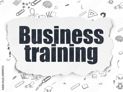 Learning concept  Business Training on Torn Paper background