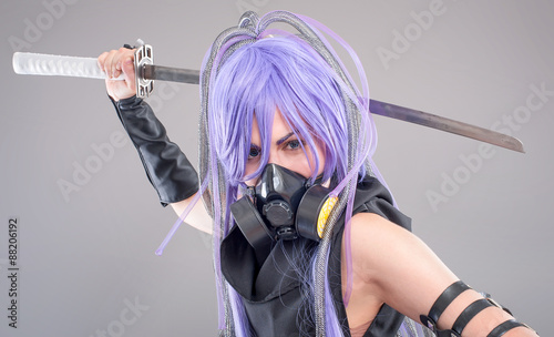 Female fantasy warrior / Female warrior with sword and gas mask isolated on the gray background