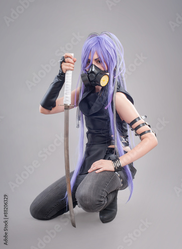 Fotografie Female fantasy warrior / Female warrior with sword and gas mask isolated on the