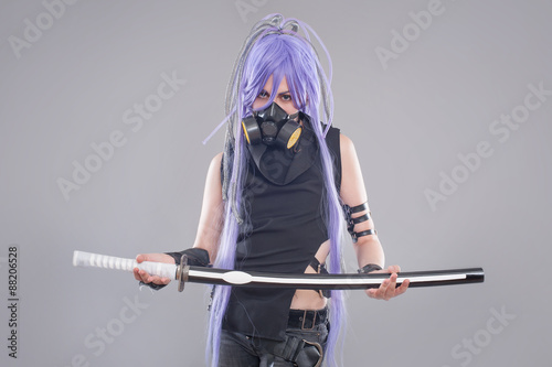 Foto Female fantasy warrior / Female warrior with sword and gas mask isolated on the
