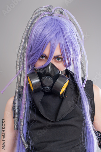 Foto Female fantasy warrior / Female warrior with sword and gas mask isolated on the