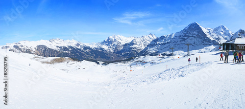 Mount Mannlichen slope and Grindelwald Valley in snow, Switzerland photo