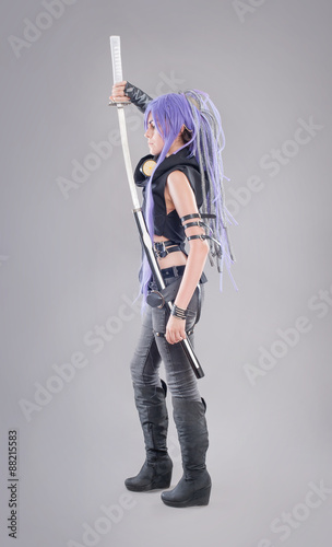 Foto Female fantasy warrior / Female warrior with sword and gas mask isolated on the