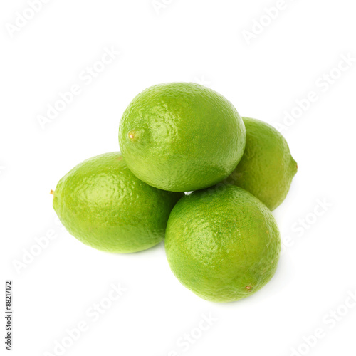 Pile of multiple ripe limes  composition isolated over the white