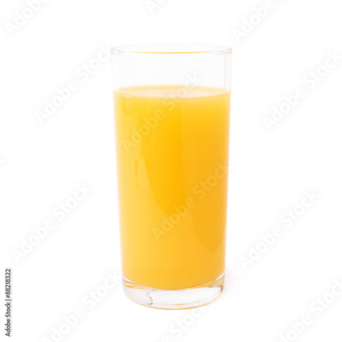 Tall glass filled with the orange juice isolated