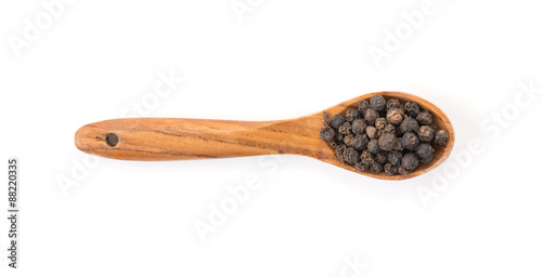 Black pepper with wood spoon