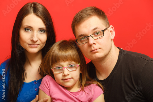 cute family of three face portrait