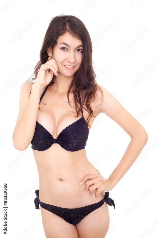 Fototapeta premium sexy beautiful young woman in bikini isolated on a white background