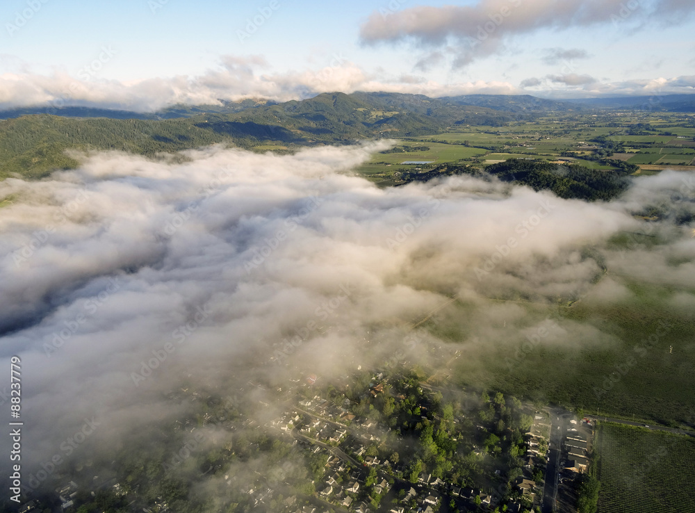 Fototapeta premium Clouds over the town