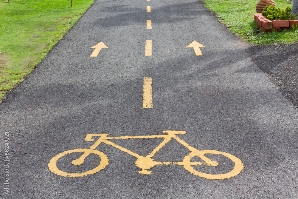 Fototapeta premium Bicycle sign in public park area.