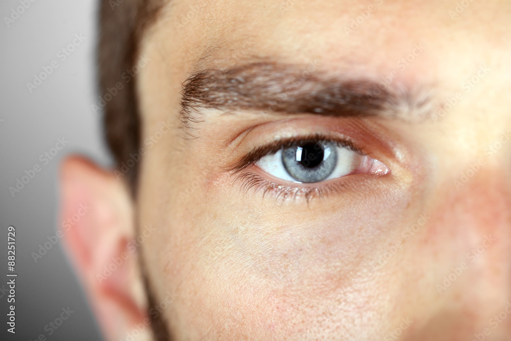 Beautiful blue man eye close up Beautiful blue man eye close up