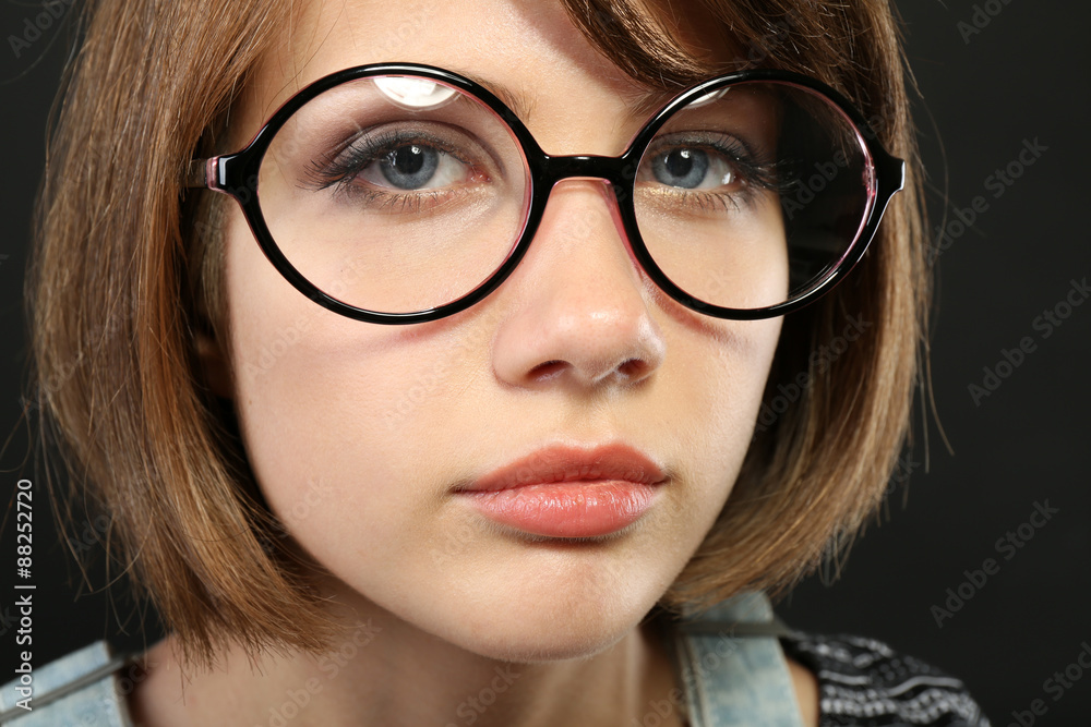 Attractive young woman with glasses close up Attractive young woman with glasses close up