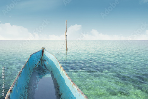 Boat on the sea with clear water