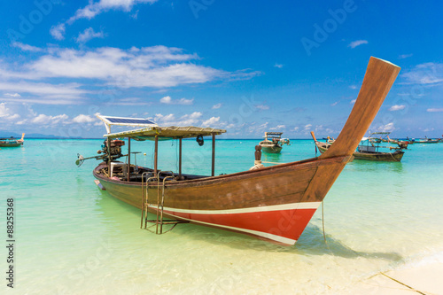 Longtail wood boat and islands in andaman sea © themorningglory