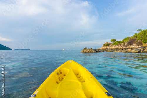 Paddling yellow kayak into the Andaman sea © themorningglory