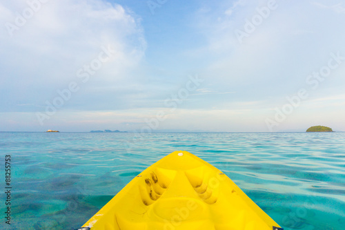 Paddling yellow kayak into the Andaman sea © themorningglory