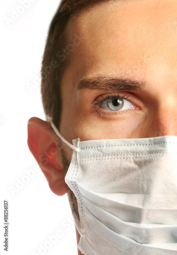 Doctor face in medical mask...