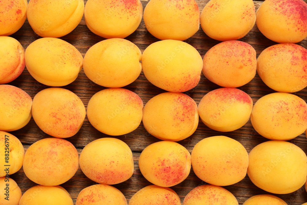 Ripe apricots on wooden table, closeup Ripe apricots on wooden table, closeup