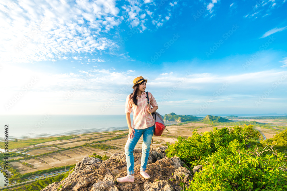 Naklejka premium Hiking woman walk on the mountain hill