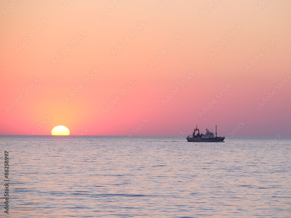 Landscape with the image of a sea sunset