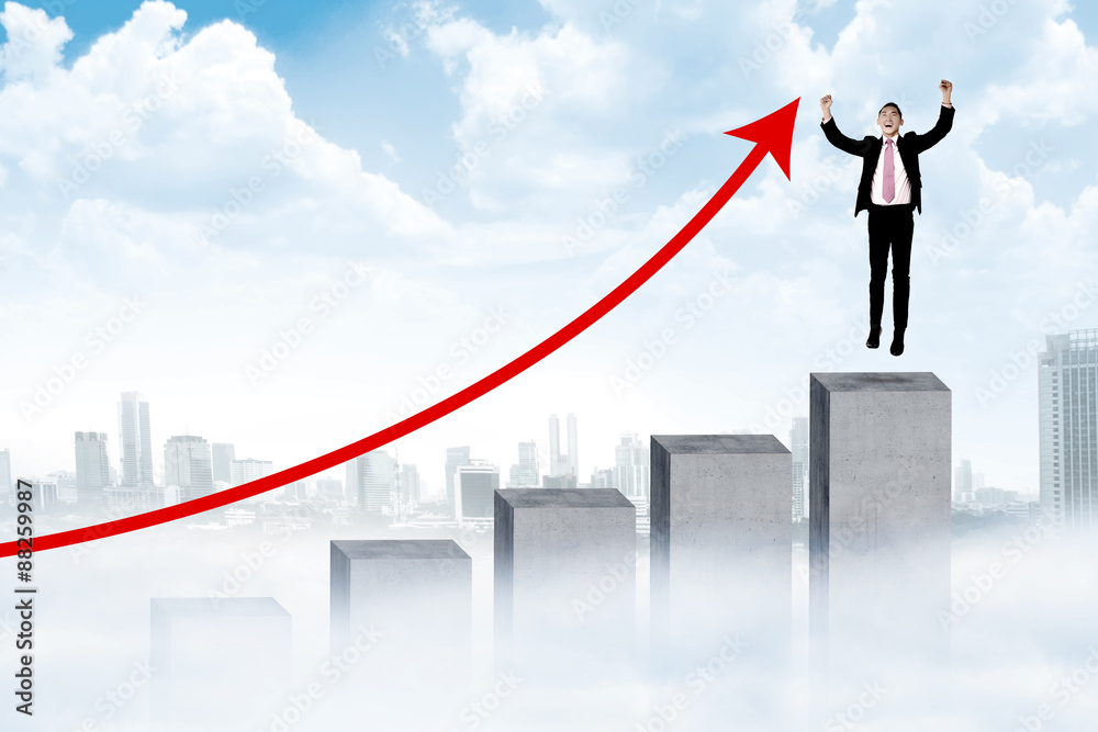 Asian man jumping on the chart Asian man jumping on the chart