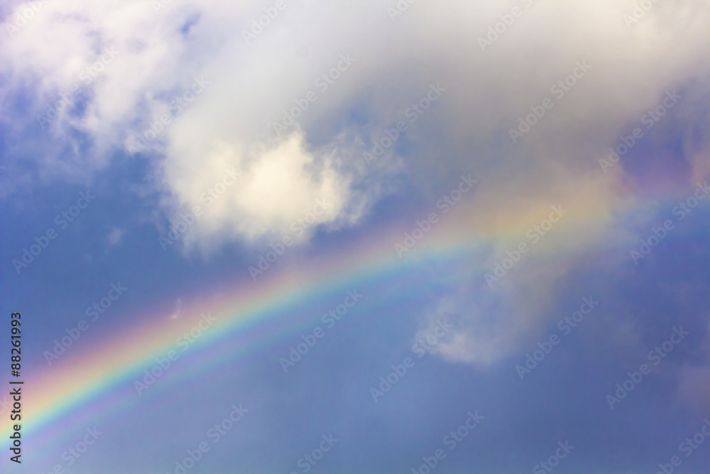   Rainbow among  clouds in the sky.Background.Soft focus.