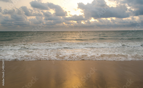 Fototapeta Naklejka Na Ścianę i Meble -  Sunset at Cloudy Beach