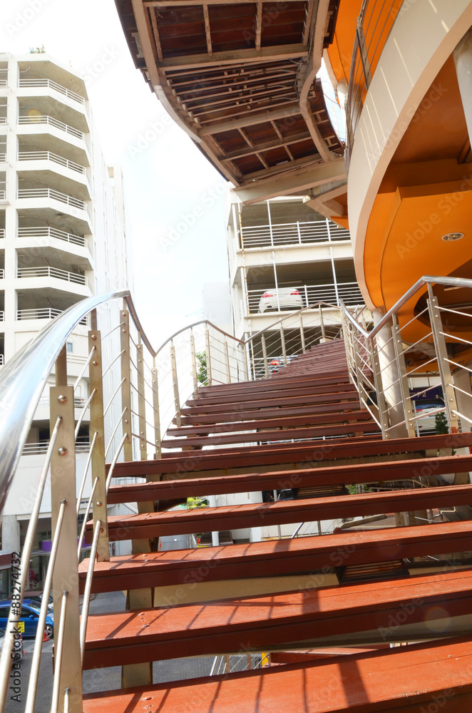 Fototapeta premium curve ladder on the side of the building