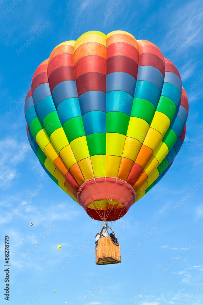 Fototapeta premium Hot air balloon over blue sky