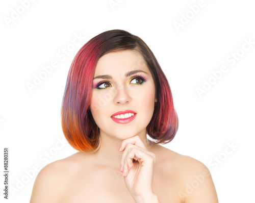 Beautiful smiling girl with colorful make-up on isolated background.