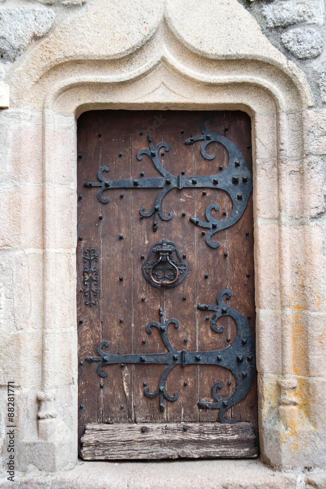 Ancient doors with forged details
