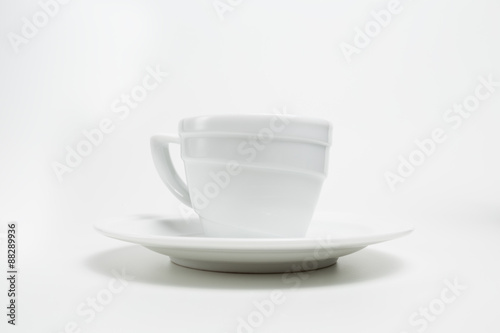 White empty coffee cup on white background