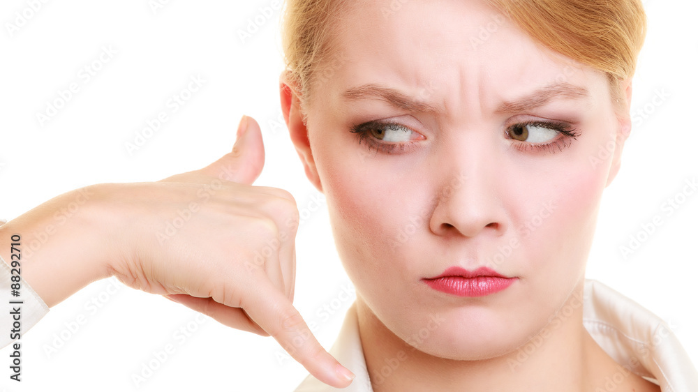 Phone. Angry businesswoman making call me gesture Phone. Angry businesswoman making call me gesture