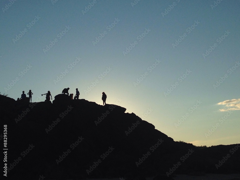 people's silhouettes on top of cliff in Ogunquit, Maine