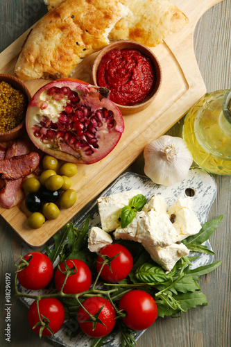 Ingredients of Mediterranean cuisine, on wooden board background