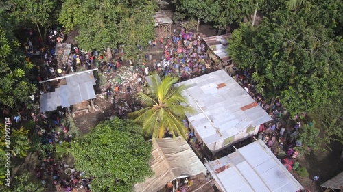 Aerial view of people gathering in the village in Papua New Guinea
