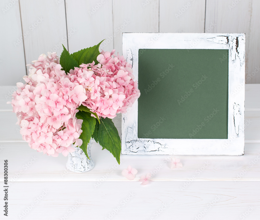 Hortense in retro vase and photo frame Hortense in retro vase and photo frame