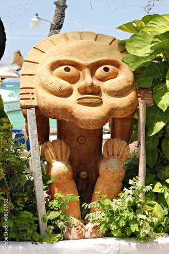 Modern statue of Taíno culture caribbean tribal coast idol figure culture wooden ceramic carving photo