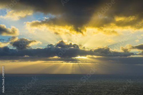 Rays breaking through the clouds at Europe?s most western point, Cabo da Roca, Portugal photo