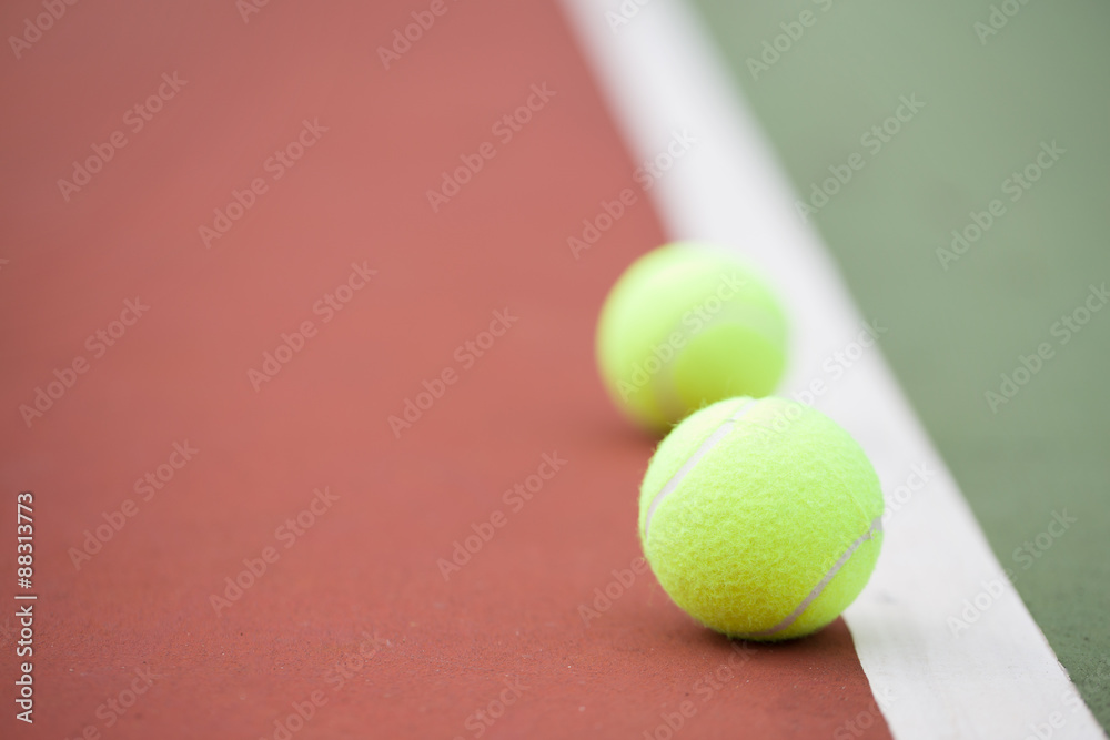 Tennis court with tennis balls