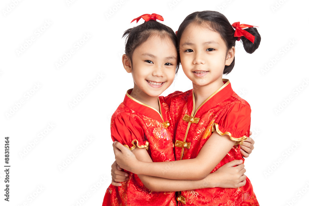 Asian twins girls in chinese cheongsam dress Asian twins girls in chinese cheongsam dress