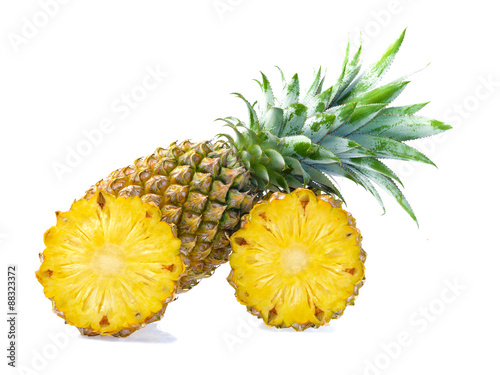 pineapple with slices isolated on white background