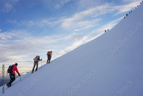 Climbers nearing the summit of Mont Blanc, 4810m, Chamonix, Rhone Alps, Haute Savoie, France photo