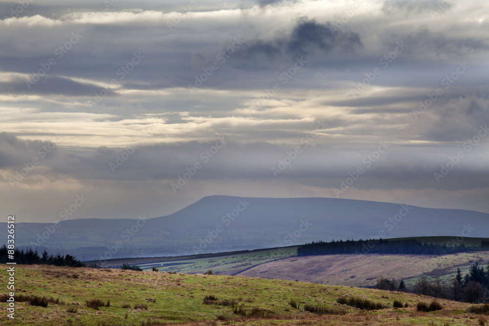 Stormy sky over Pendle Hill from above Settle, North Yorkshire, Yorkshire Stormy sky over Pendle Hill from above Settle, North Yorkshire, Yorkshire