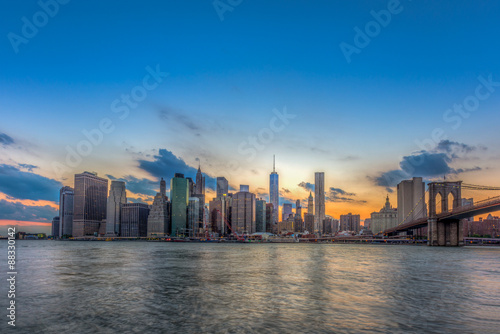 New York City Manhattan downtown skyline and Brooklyn bridge.
