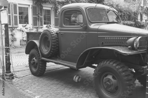 Vintage trucks. Soccer ball rolled under the truck.