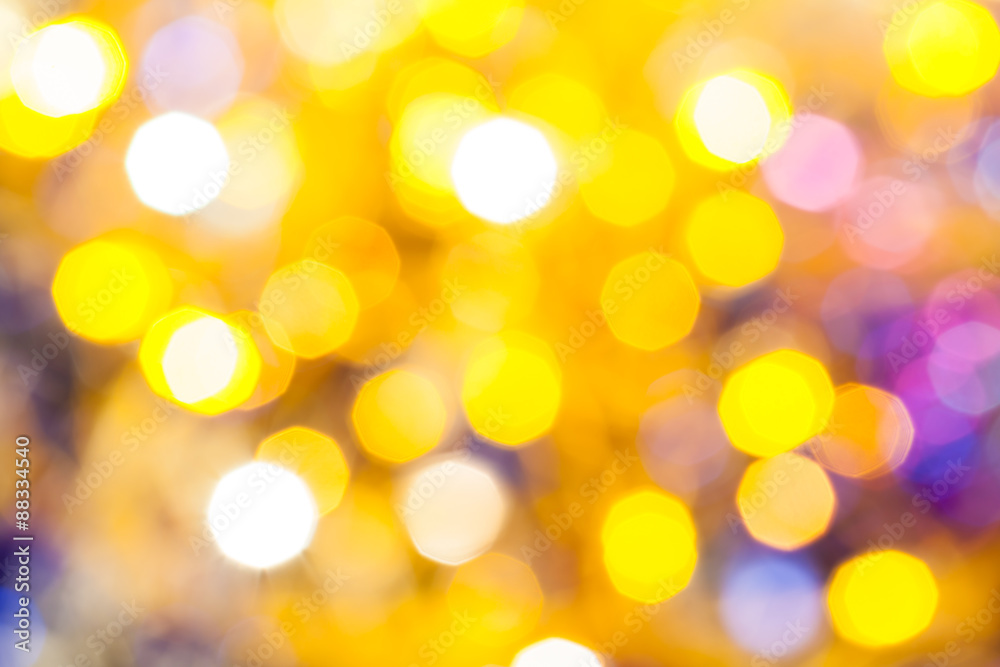 Fototapeta premium yellow violet blurred shimmering Christmas lights