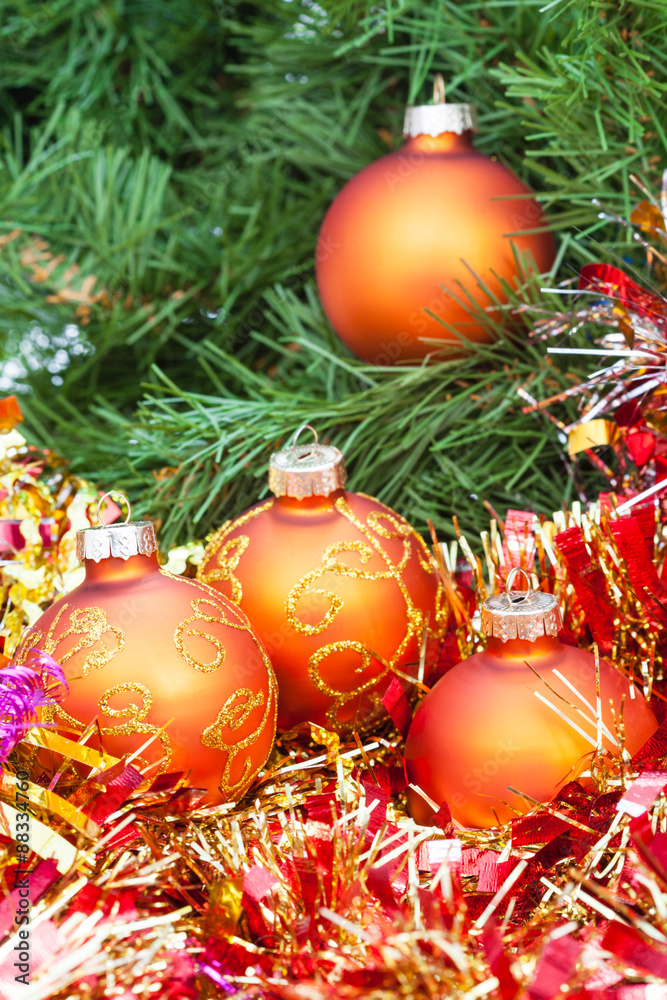 orange Christmas balls, red tinsel on Xmas tree 1 orange Christmas balls, red tinsel on Xmas tree 1