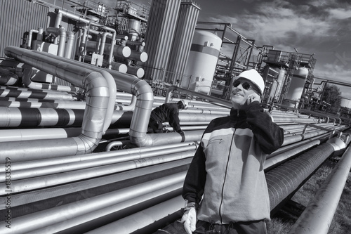 giant pipeline construction, engineer checking for leaks photo