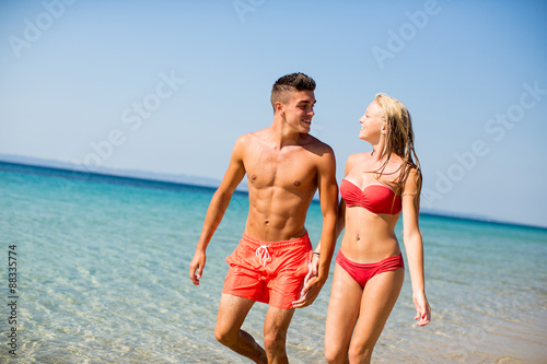 Young couple relaxing on the beach